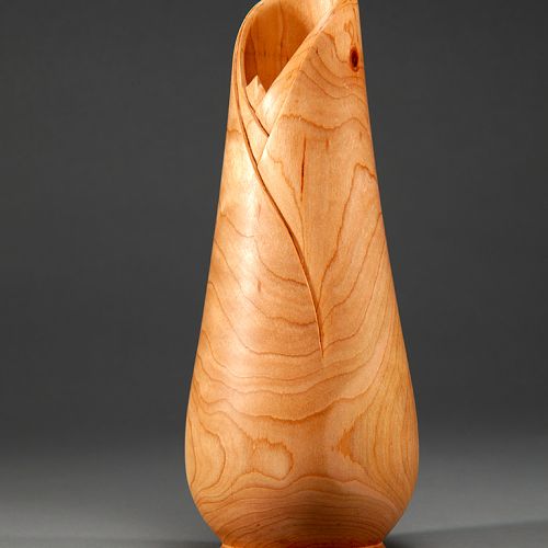 11.5" Cherry Vase turned and carved.