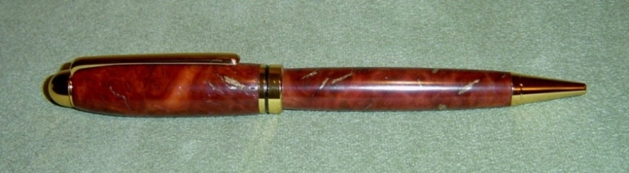 Amboyna Burl Designer pen with Brass Fillings