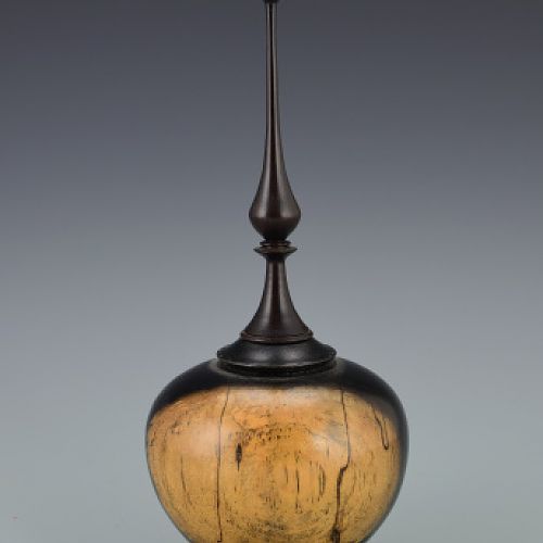 Vessel with finial