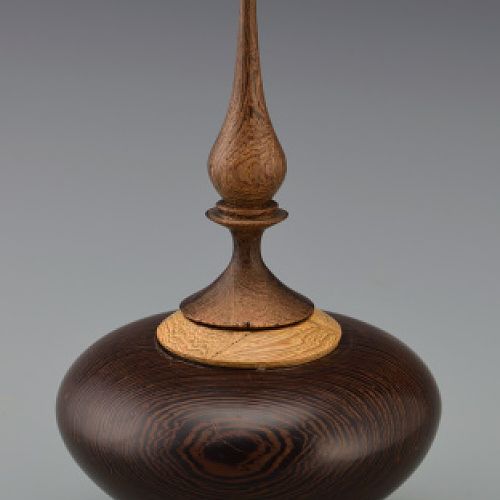 Hollow form with finial