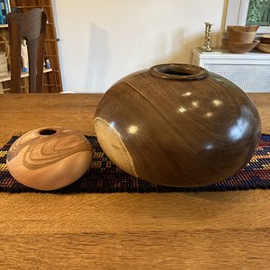 A pair of hollow forms - Walnut and beech