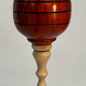 Padauk hollow form with holly finials