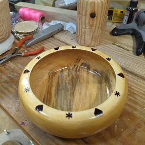 Maple bowl with burned embellishment