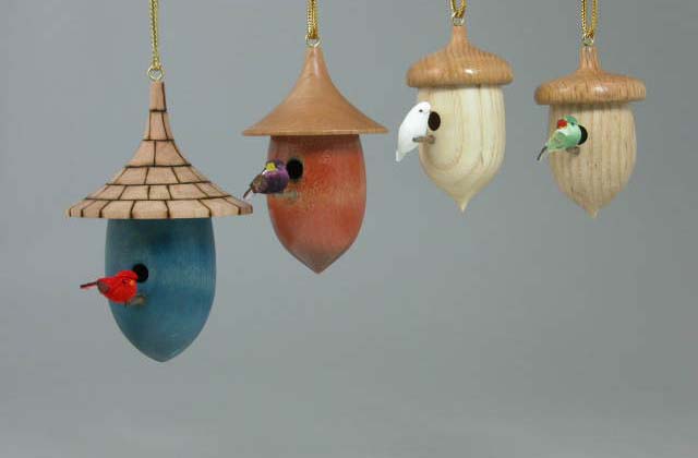 A collection of small bird house ornaments