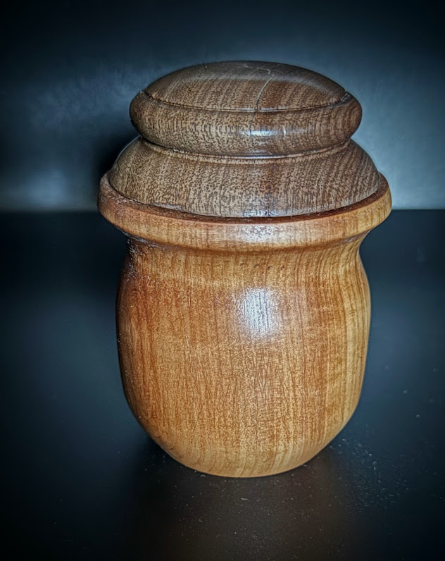 Apple wood box with a Walnut cap.