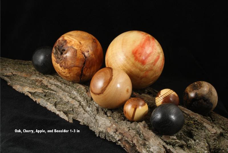 Bevy of bodacious balls brazenly balanced on a burly butternut bark board