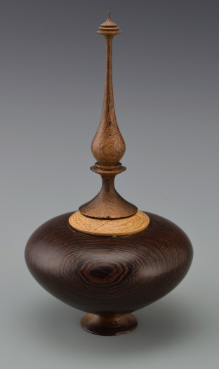 Teak hand turned hollow selling form with zebrawood, walnut and hackberry finial