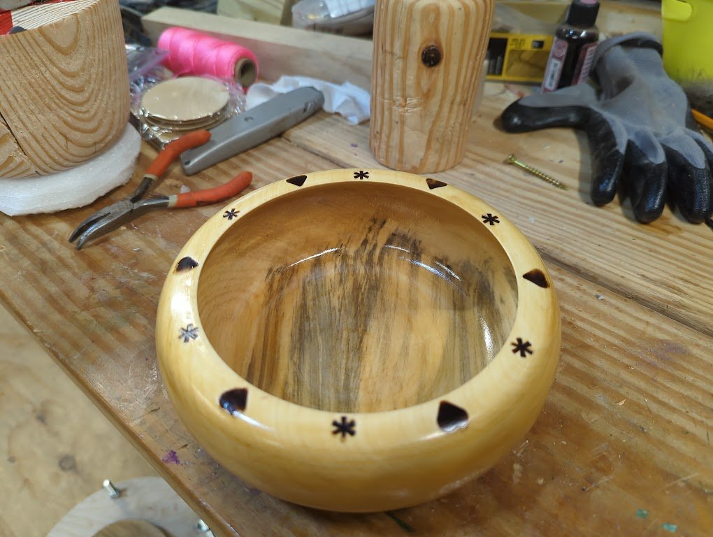 Maple bowl with burned embellishment