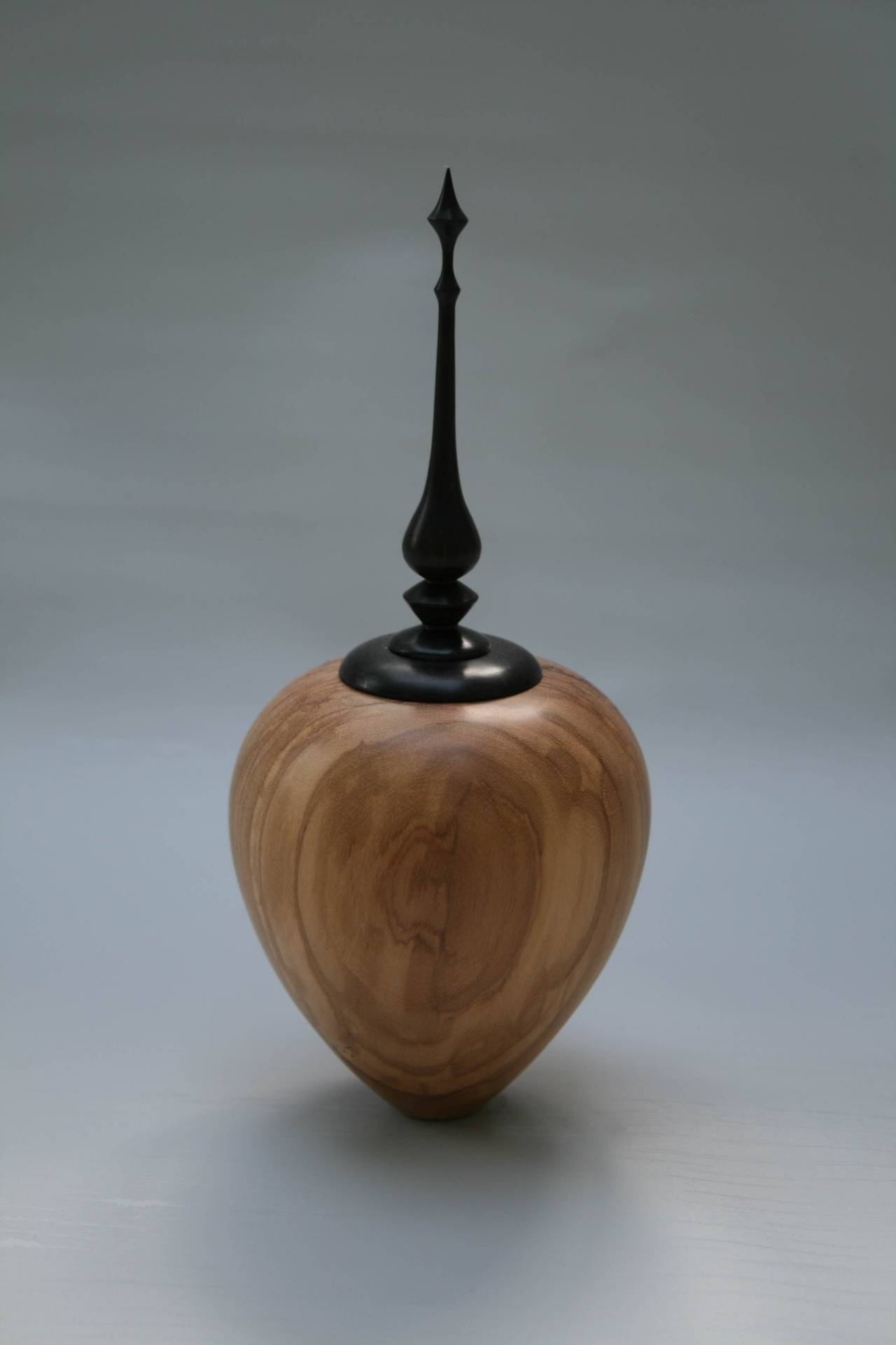 Olive wood w/ black wood finial