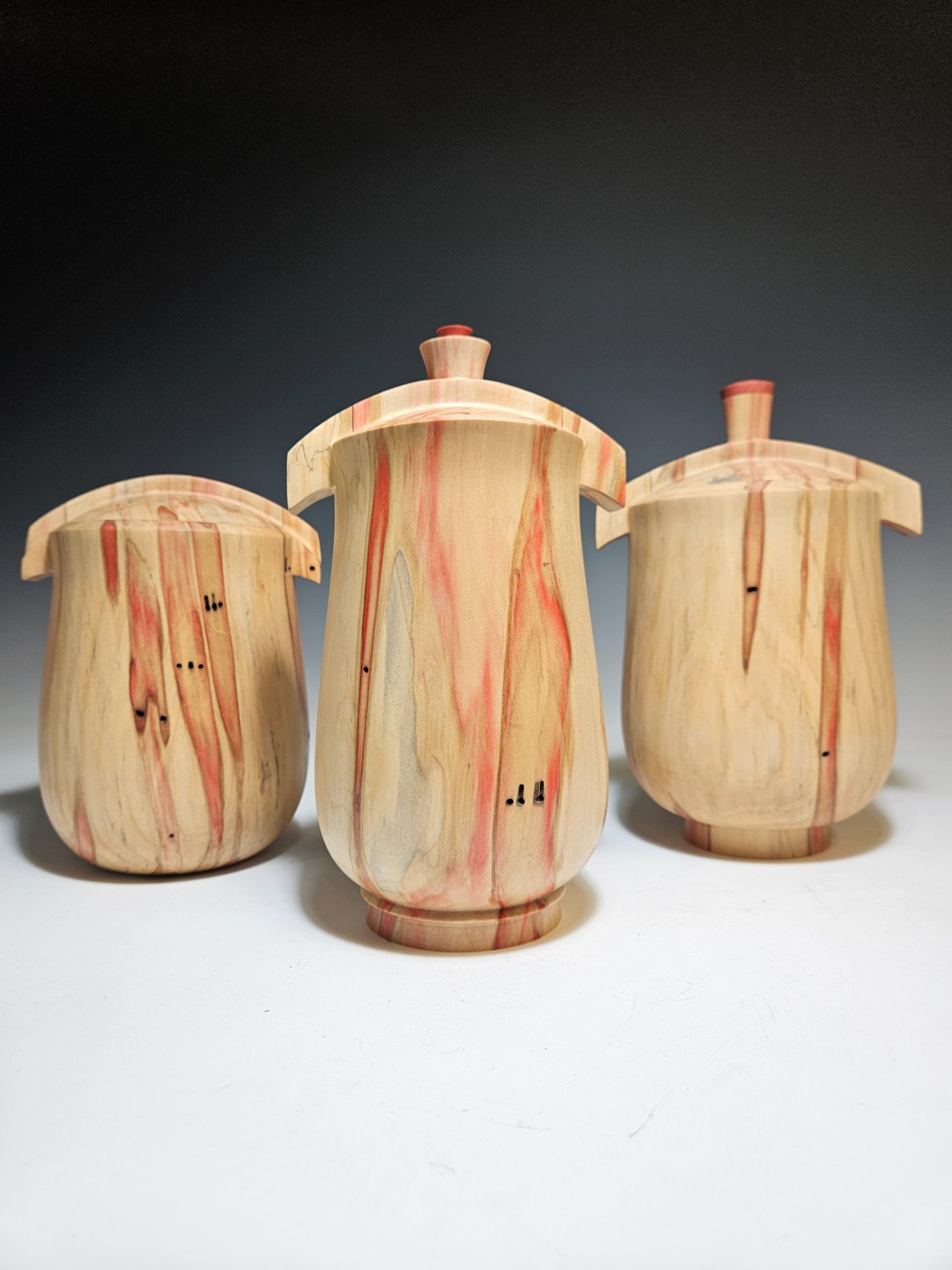 Set of 3 Boxelder Ridgeback lidded vessels.