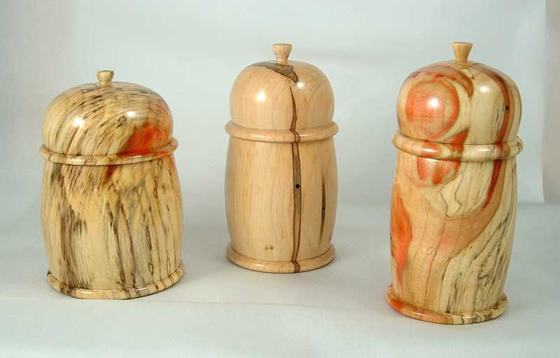 Trio of lidded boxes