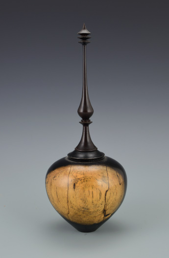 Vessel with finial